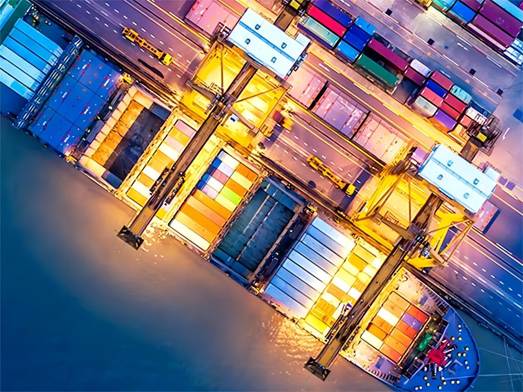 Container ship loading lighting products at a busy port