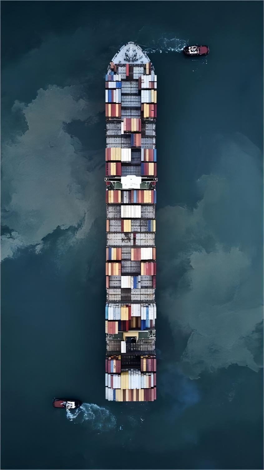 Container ship at a busy port with containers being loaded