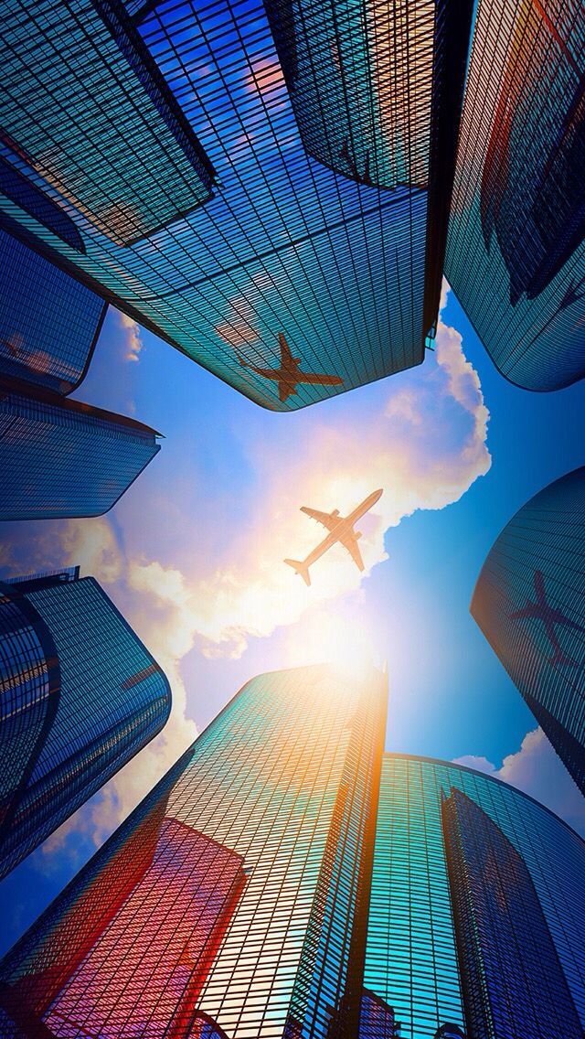 Workers carefully loading flat-packed furniture into a 40HQ shipping container
